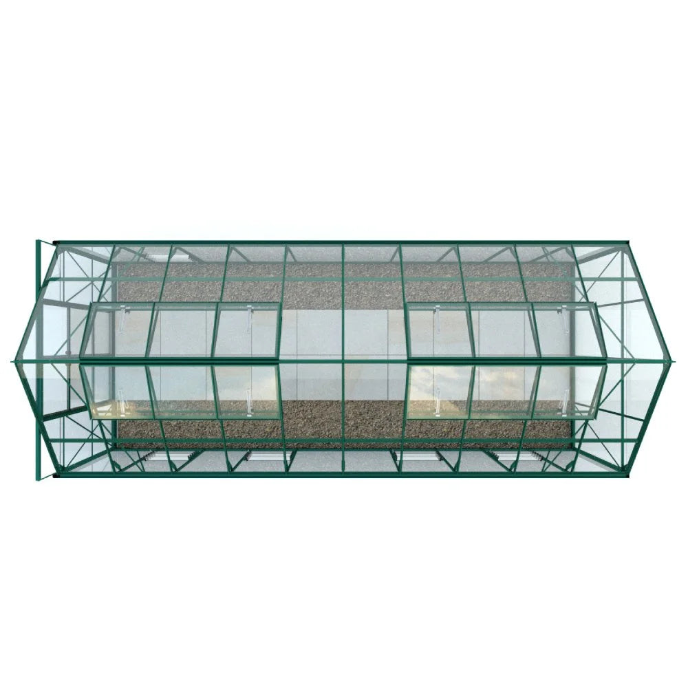 Rhino Greenhouse with a green metal frame and glass panels is viewed from above; inside, a gravel floor is visible. It is isolated on a plain white background.