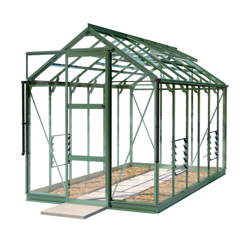 A green metal-framed Rhino Greenhouse stands on a white background, showcasing its transparent panels and front opening door, with a gravel interior and concrete step outside.