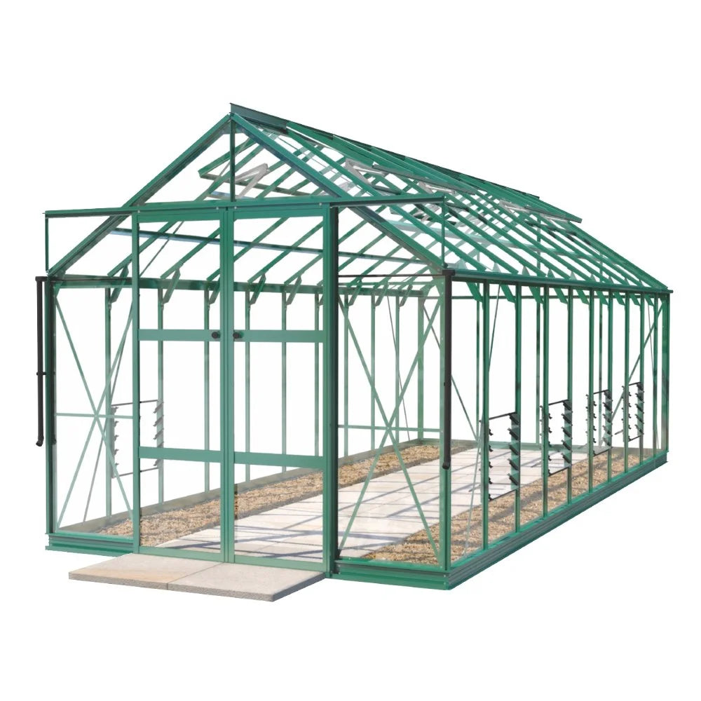 A large, green metal-framed Rhino Greenhouse stands on a paved walkway. The structure features glass panels and angled roof windows, situated in a plain white background.
